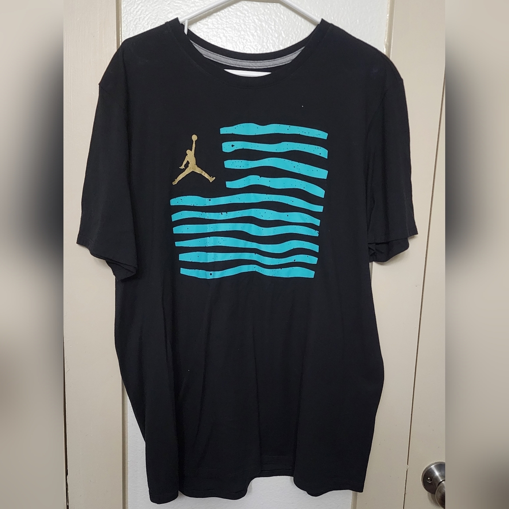 Jordan Black Tee with Teal Waves and Gold Logo